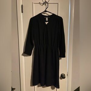 Black button-up gothic dress.